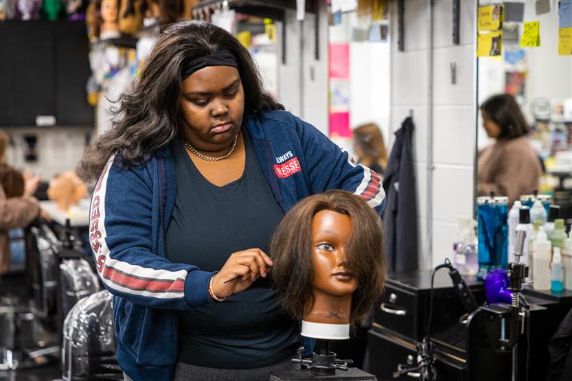 Centennial High students in the cosmetology class